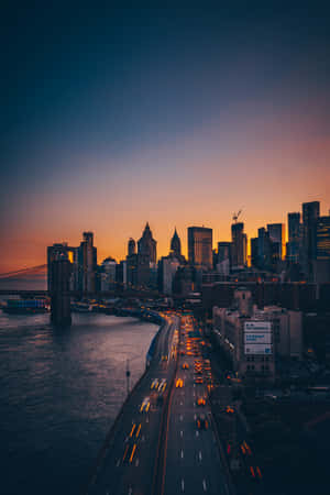 A Tranquil View Of The Skyline At Dusk Wallpaper