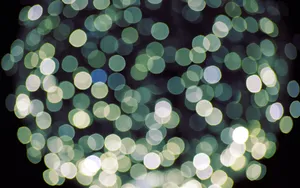 A Vibrant Green Orb With A Delightful Aesthetic Wallpaper
