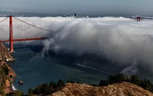 A View Of San Francisco's Bustling Financial District From The Water. Wallpaper