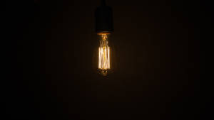 A Vintage Light Bulb To Help You Dim The Lights With Style. Wallpaper