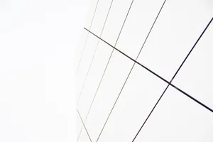 A White Building With A Clock On It Wallpaper