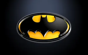 A Winged Silhouette Of A Bat Against A Full Moon Wallpaper