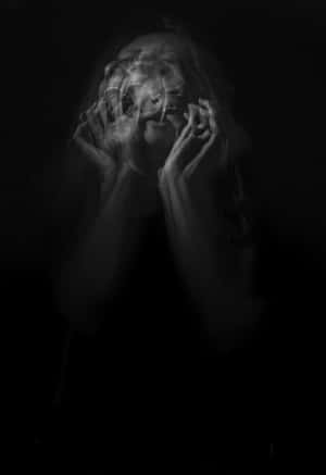 A Woman With Her Hands In The Air Wallpaper