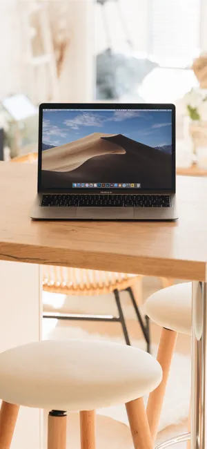 A Wooden Iphone Desk Setup Wallpaper