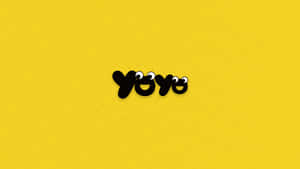 A Yellow Background With The Word Yoyo On It Wallpaper