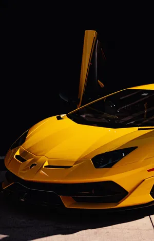 A Yellow Sports Car Wallpaper