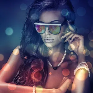 A Young Girl Enjoying Her Ipad Wallpaper