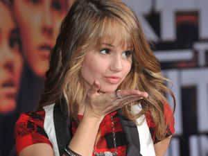 A Young Woman With Long Hair And A Vest Wallpaper