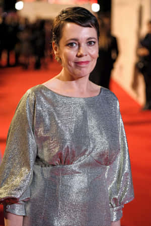 Acclaimed Actress Olivia Colman In Elegant Attire Wallpaper