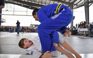 Achieving Half Guard Positon In Brazilian Jiu-jitsu Wallpaper