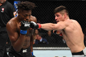 Action-packed Fight Between Vicente Luque And Jalin Turner Wallpaper