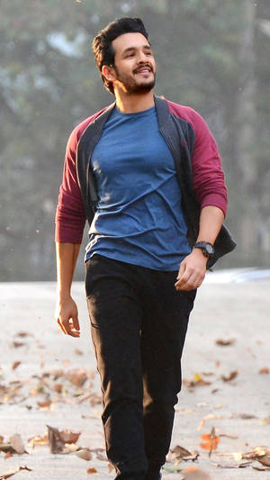 Actor Akhil Akkineni Enjoying A Peaceful Afternoon Walk. Wallpaper