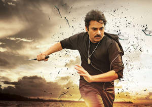 Actor Pawan Kalyan In Intense Scene With Survival Knife Wallpaper