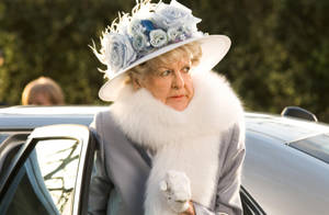 Actress Elaine Stritch White Fur Scarf And Floral Hat Wallpaper