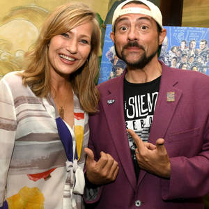 Actress Joey Lauren Adams With Filmmaker Kevin Smith Wallpaper