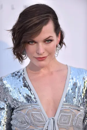 Actress Milla Jovovich Silver Gown Red Carpet Wallpaper