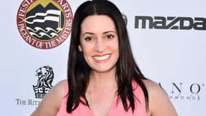 Actress Paget Brewster Striking A Pose Wallpaper