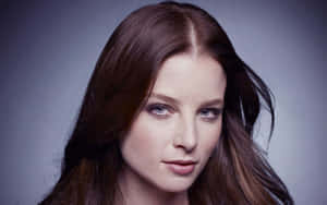 Actress Rachel Nichols Posing For The Camera Wallpaper