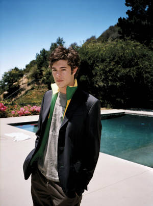 Adam Brody In Pool Wallpaper