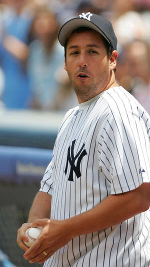 Adam Sandler Caught In Action Playing Baseball Wallpaper