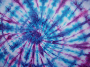 Add A Splash Of Color To Your Wardrobe With Purple Tie Dye! Wallpaper