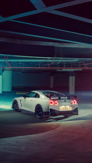 Add A Touch Of Nature To Your Phone With The Nissan Skyline Wallpaper