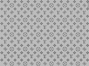 Add A Touch Of Style To Your Wardrobe With This Luxurious Louis Vuitton Pattern. Wallpaper