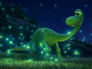Adorable Dinosaur On Desktop Wallpaper