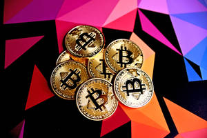Advance Your Portfolio With The Innovative Technology Of Bitcoin Wallpaper