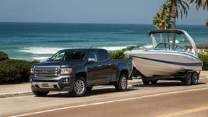 Adventurous Trip With Gmc Vehicle And Motor Boat Wallpaper