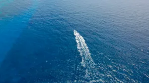 Aerial View Of A Sailing Boat Wallpaper