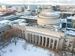 Aerial View Of Snowy Mit Great Dome Wallpaper