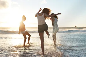 Aesthetic Beach Women Having Fun Wallpaper