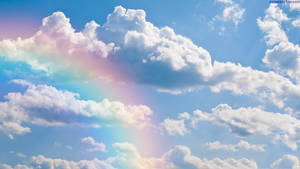Aesthetic Cloud With A Rainbow Wallpaper