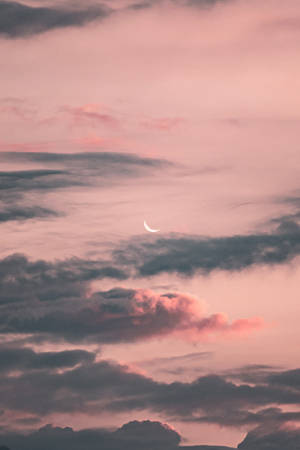 Aesthetic Crescent Moon In Pink Sky Wallpaper