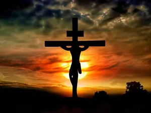 Aesthetic Jesus On Cross At Sunset Wallpaper