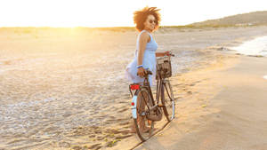 African Woman Holding Her Bike Wallpaper