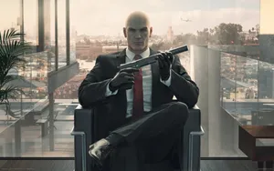 Agent 47 Legs Crossed Hitman 3 Wallpaper