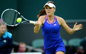 Agnieszka Radwanska Executing A Stable Forehand Stroke. Wallpaper