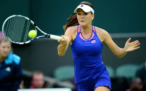 Agnieszka Radwanska Executing A Stable Forehand Stroke. Wallpaper