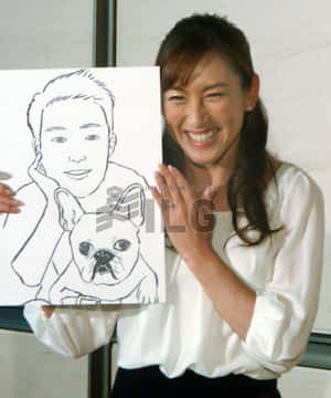 Ai Sugiyama Fiercely Engaged In A Tennis Match Wallpaper