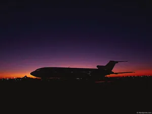 Airplane At Sunset Wallpaper