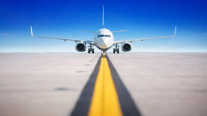 Airplane On Narrow Runway Wallpaper