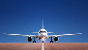 Airplane Runway Under Clear Sky Wallpaper