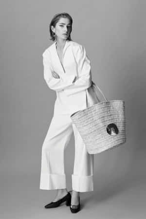 All-white Patou Outfit With Bag Wallpaper