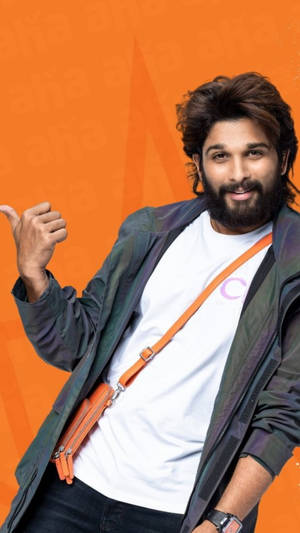 Allu Arjun Hd Orange Background Wallpaper