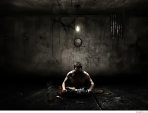 Alone Boy Sitting Inside The Jail Wallpaper