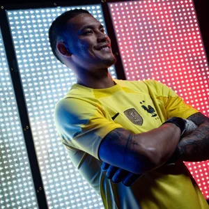 Alphonse Areola With Arms Crossed Wallpaper