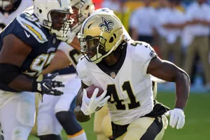 Alvin Kamara Celebrating A Touchdown Wallpaper