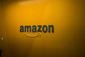Amazon Logo On Yellow Background Wallpaper